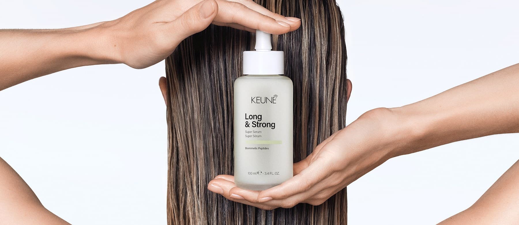 Official KEUNE Care campaign showing Long and Strong serum against glossy hair